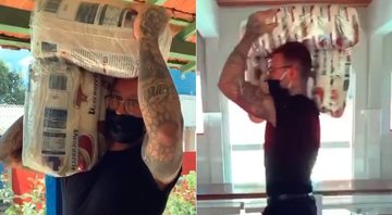 Lucas Lucco mostrou doação de alimentos e chamou a atenção por carregar 12 sacos de arroz de uma só vez - Foto: Reprodução/ Instagram