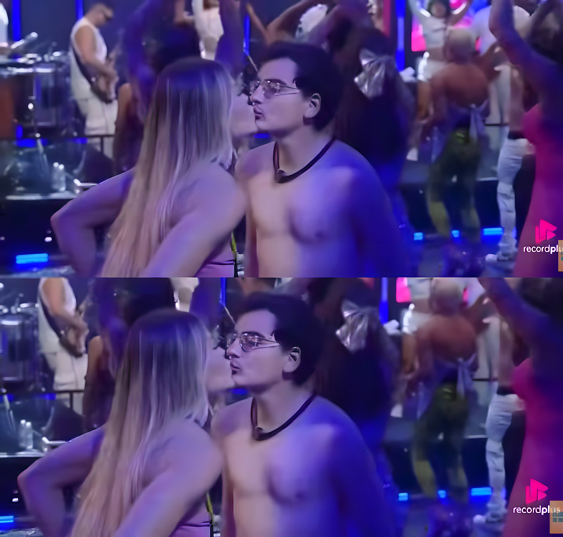 Saory e Dudu Camargo dão selinho durante festa no reality - Foto: Reprodução